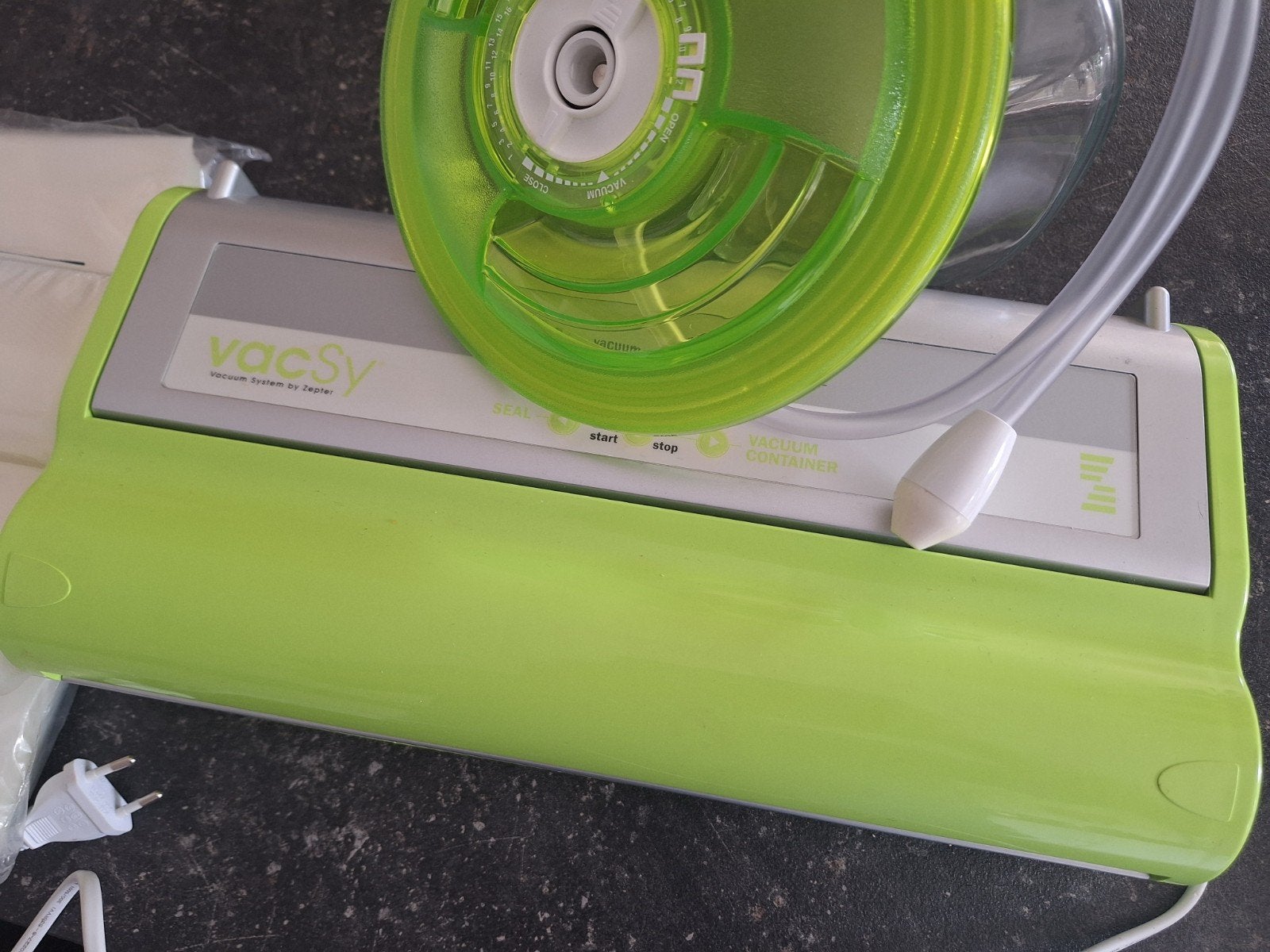 Vacsy vacuum machine en toebehoren, Ophalen