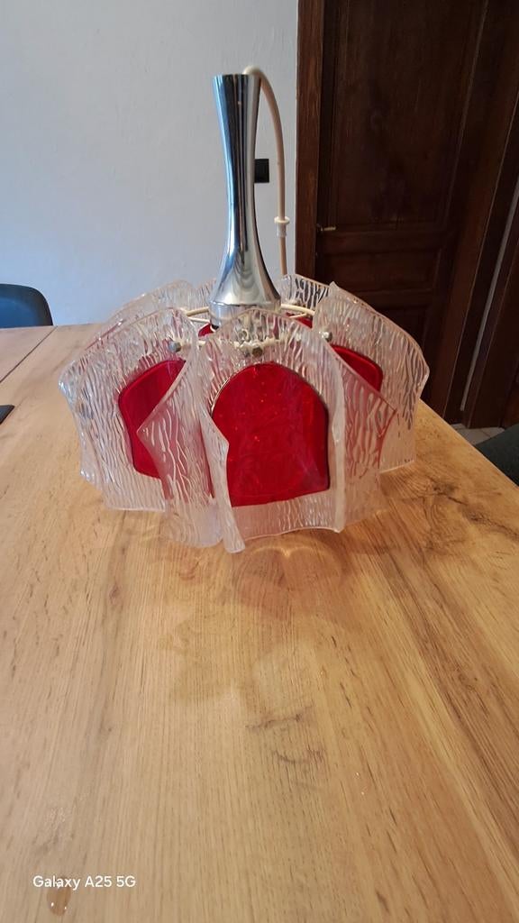 kroonluchter uit het ruimtetijdperk, Ophalen