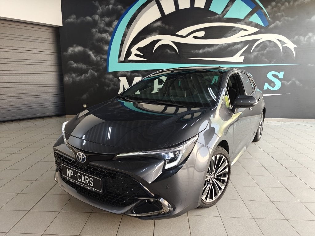 Toyota Corolla 1.8 Hybrid Style + tech pack, Auto's, Toyota, Berline, 5 deurs, Dealer onderhouden, Zilver of Grijs