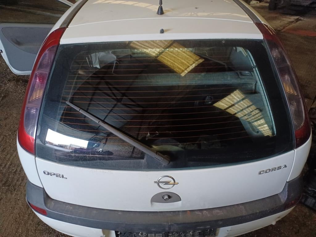 Opel Corsa C kofferdeksel, Ophalen, Opel