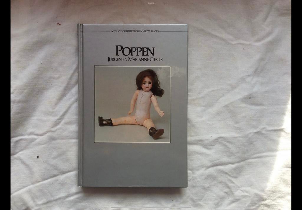 Poppen boek, Ophalen of Verzenden, Zo goed als nieuw