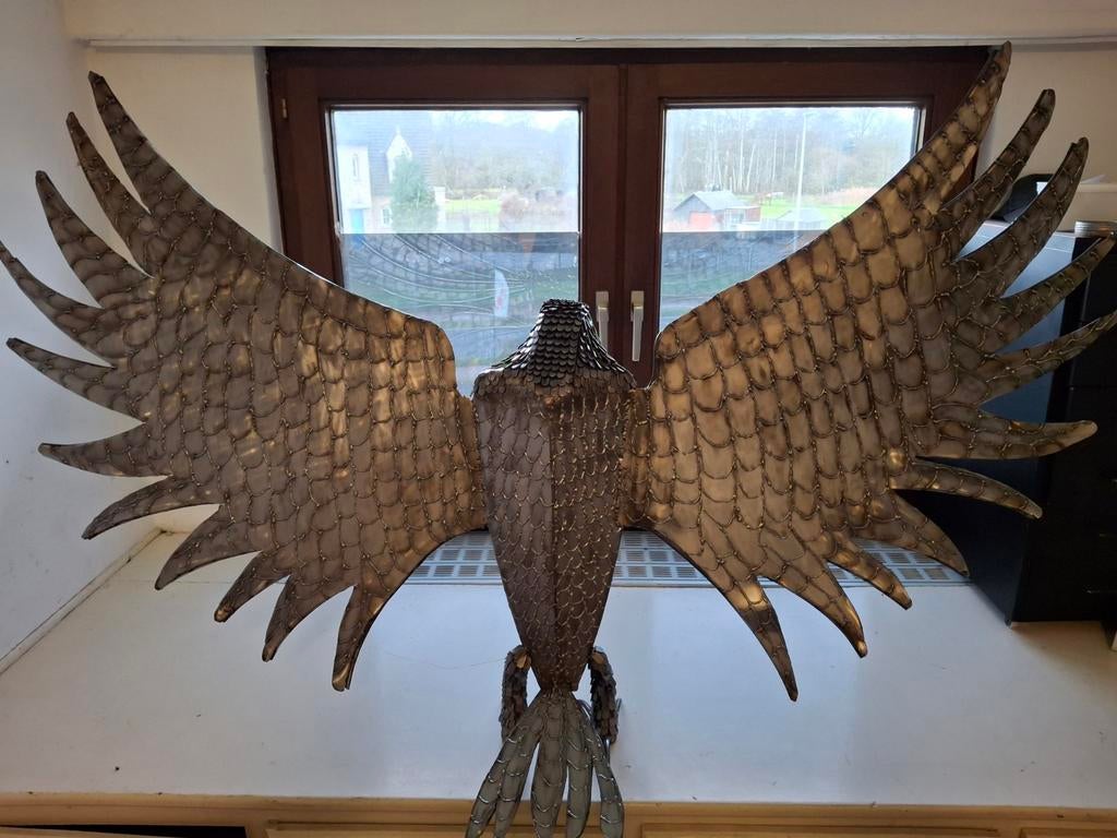 Metalen Arend, Ophalen