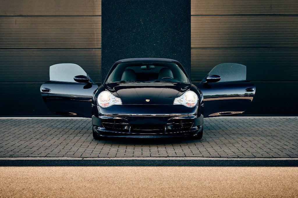 Porsche 996 Carrera cabrio tiptronic 320pk full option, Achterwielaandrijving, Cabriolet, Blauw, Leder