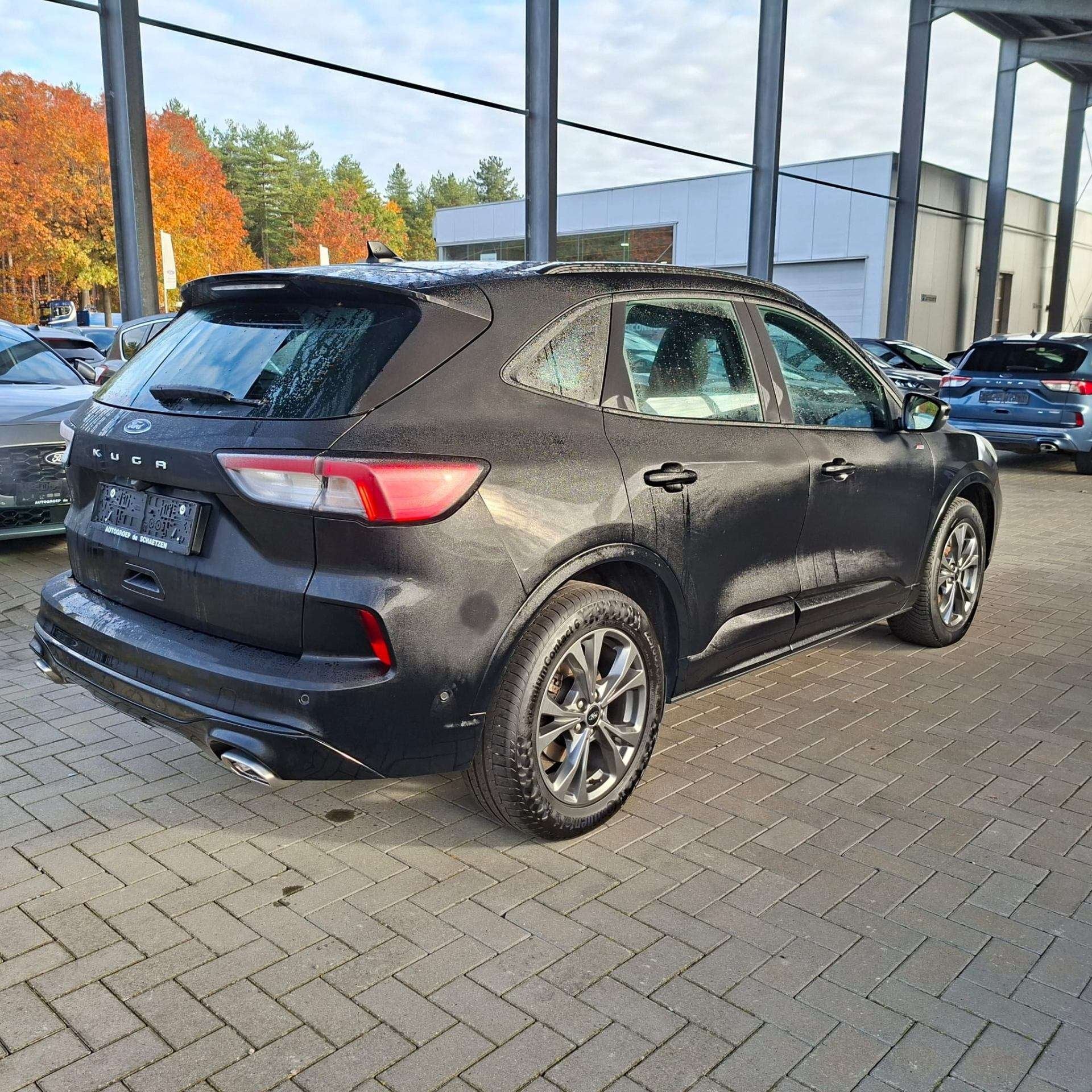 Ford Kuga St - Line PHEV / Winterpack / Head up Display, Auto's, Automaat, Stof, Gebruikt, Zwart