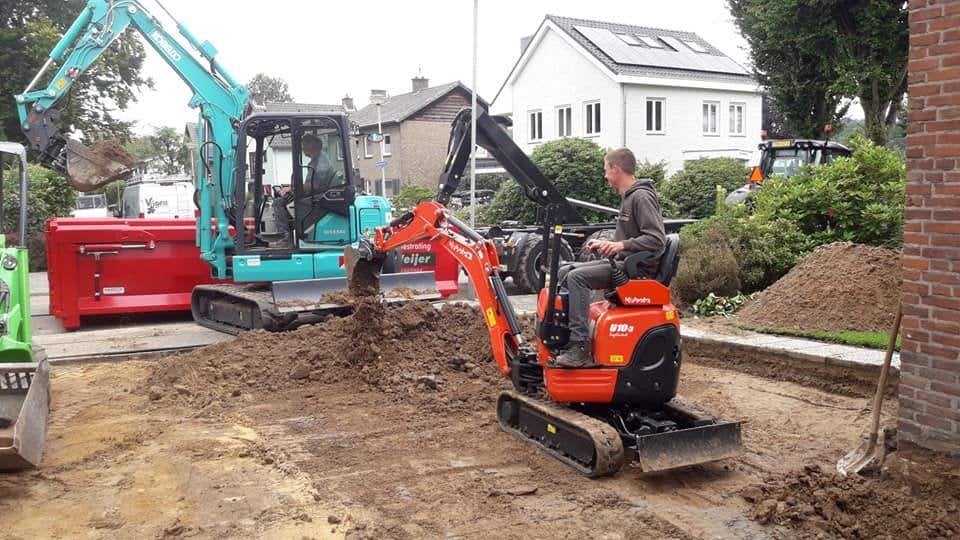 Minigraver met machinist, Tuin en Terras, Ophalen