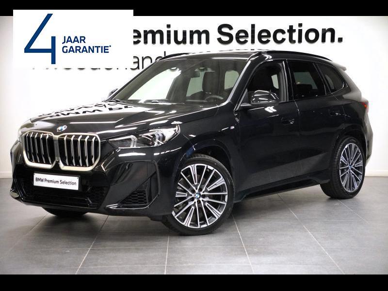 BMW Serie X X1 M PACK PANOTAMADAK TREKHAAK DRIVE ASSIST PROF, Auto's, Euro 6, USB, Zwart, 5 deurs