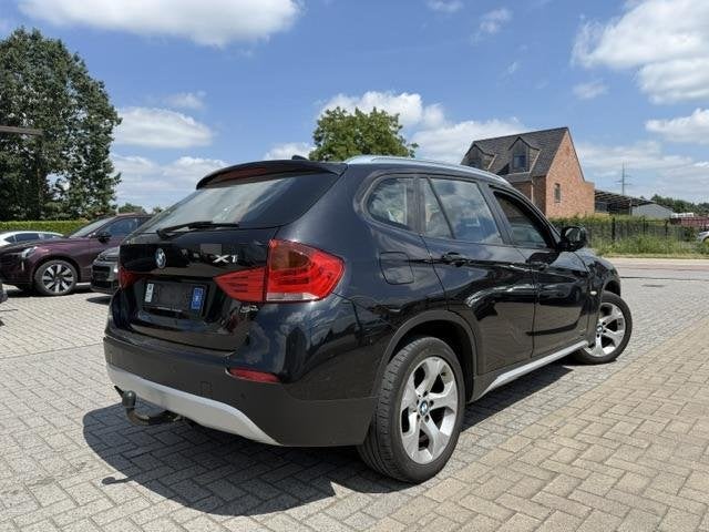 BMW X1 2.0 Benzine | Trekhaak | 1 eigenaar | 1 JAAR GARANTIE, Auto's, Achterwielaandrijving, 4 cilinders, 136 pk, 1465 kg