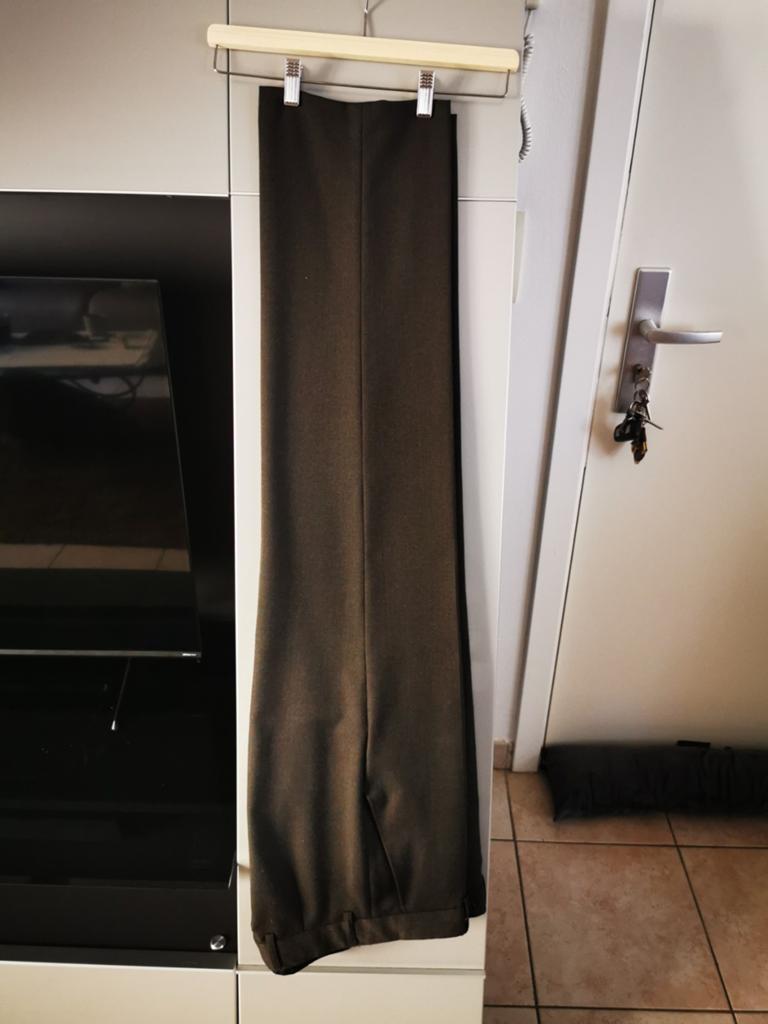 Geklede heren broeken (s), Ophalen
