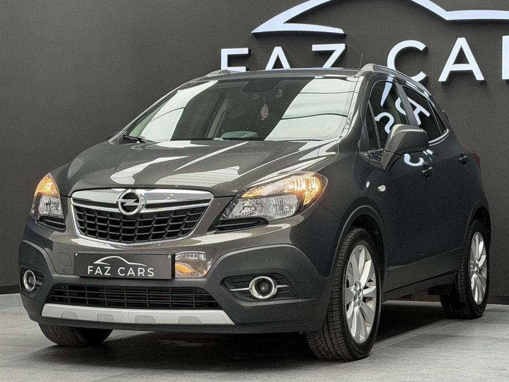 Opel Mokka 1.4 Turbo 4x2 Cosmo * CUIR + GPS + CLIM + GARANTI, Auto's, Voorwielaandrijving, 1828 kg, Gebruikt, 4 cilinders