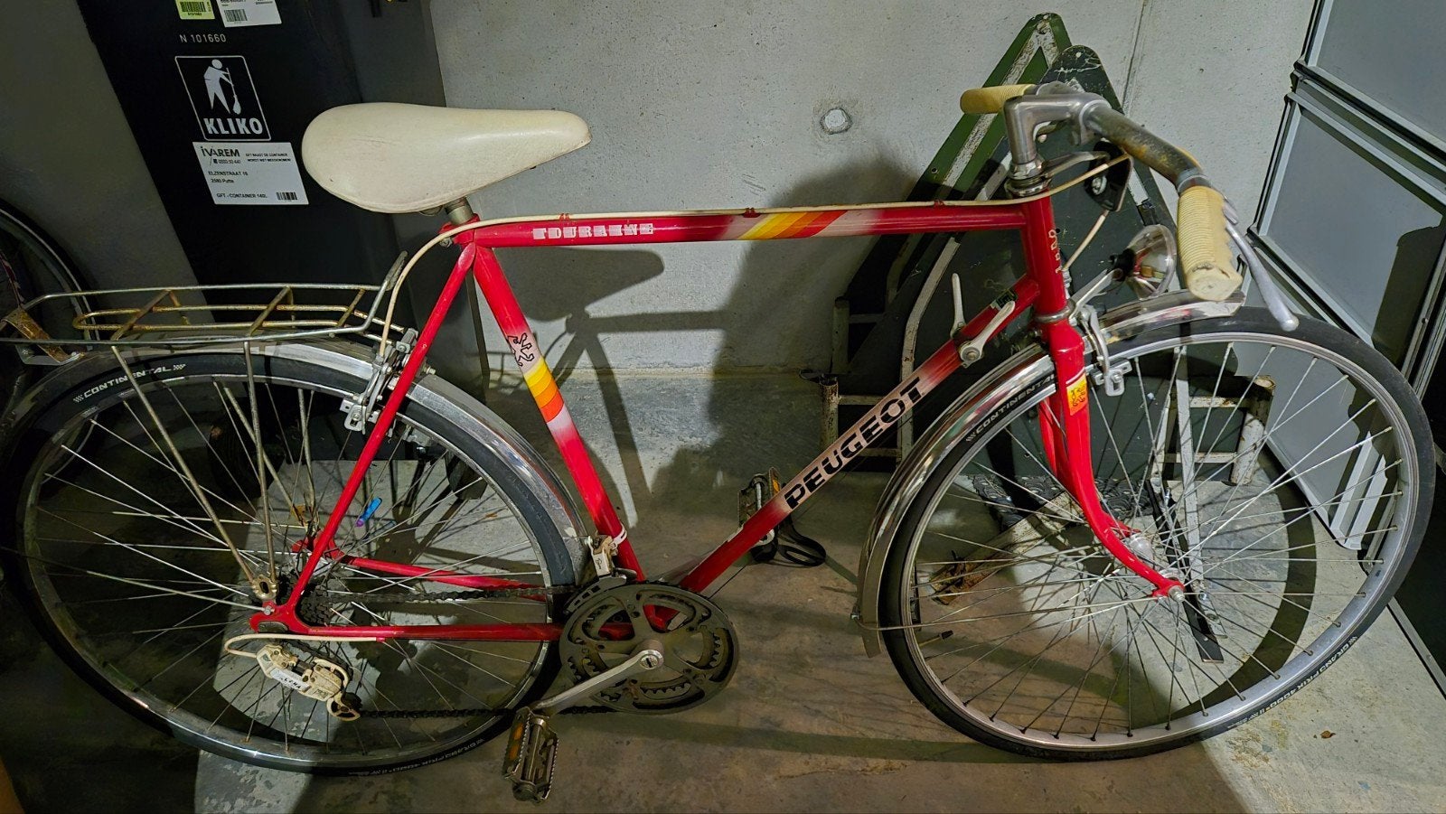 Vintage Peugeot sportfiets, Ophalen
