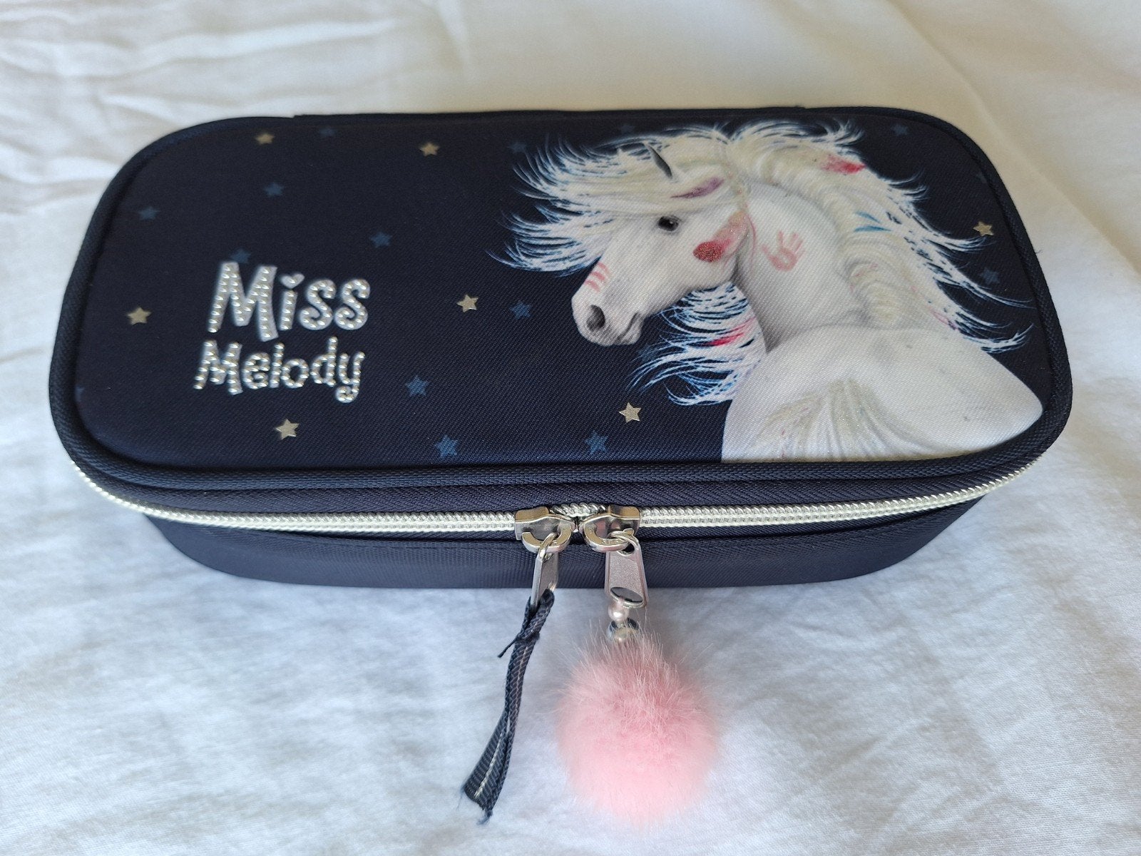 Pennenzak, merk Miss Melody, Ophalen