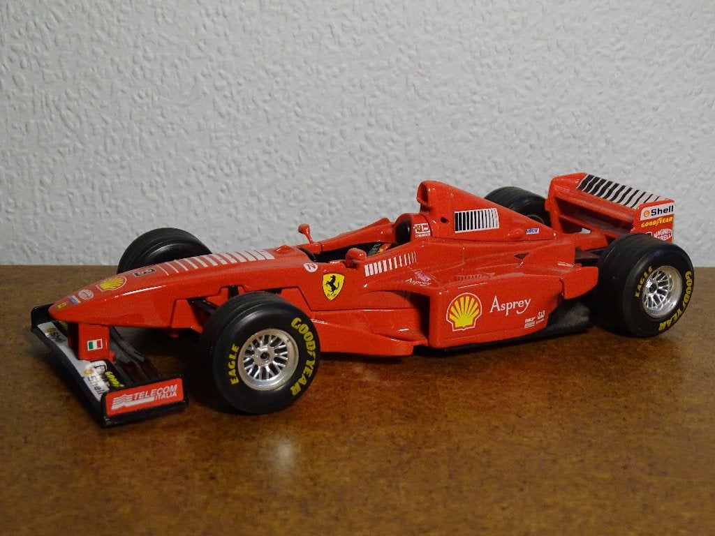Ferrari F300  1:24 Bburago, Hobby & Loisirs créatifs, Enlèvement ou Envoi, Comme neuf, Voiture, Burago