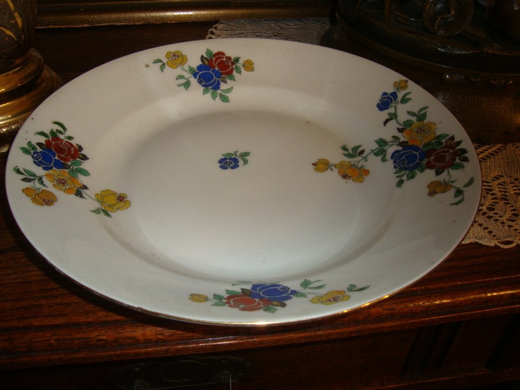 Plat rond en porcelaine de Limoges., Enlèvement