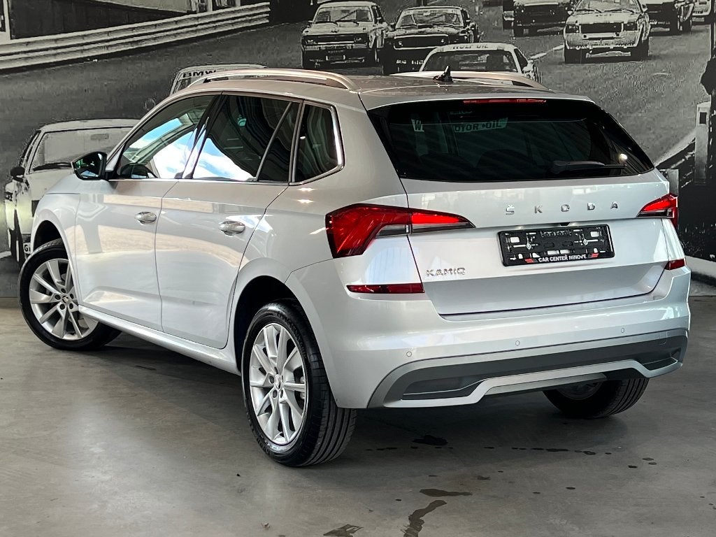 Skoda Kamiq 1.0 TSI Ambition DSG * Navigatie * ParkAssist, Auto's, Stof, Verwarmde buitenspiegels, 5 zetels, 3 cilinders