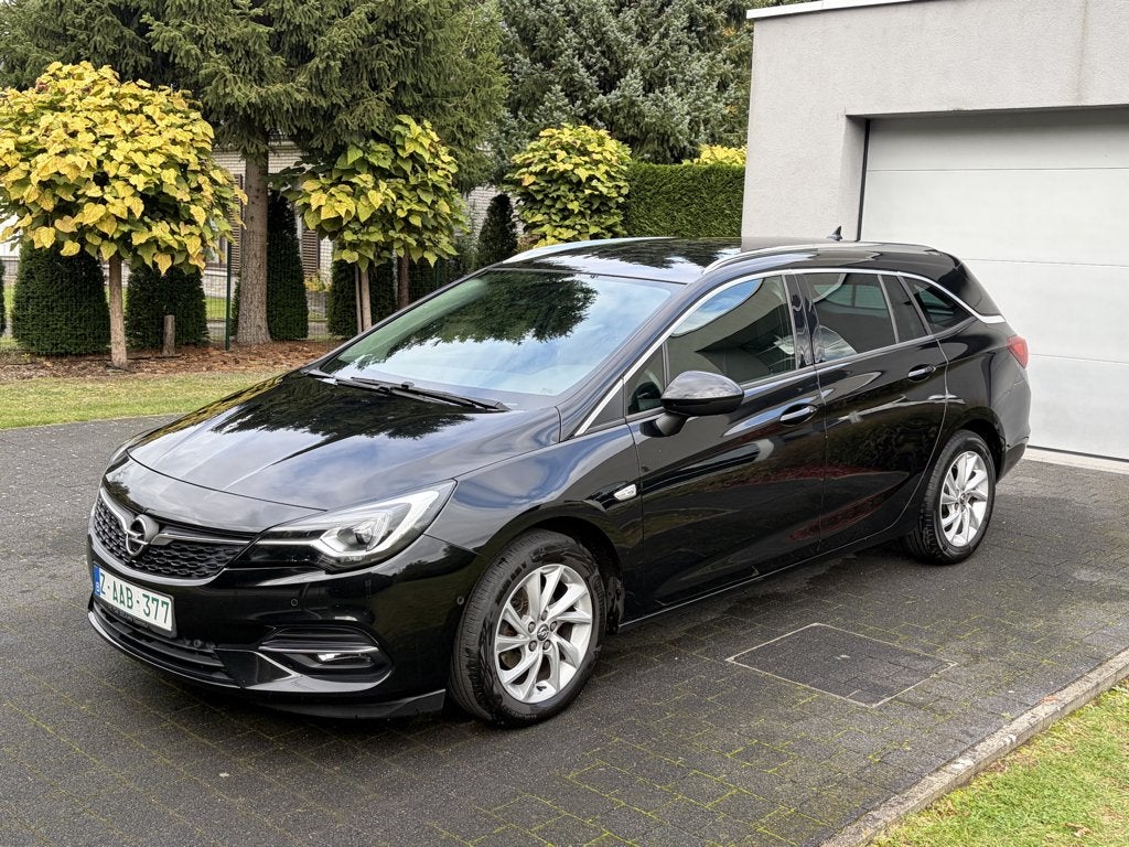 Opel Astra Sport Tourer 1,5D Automaat -GPS -Camera -Keyless, Auto's, Dealer onderhouden, 4 cilinders, Zwart, Leder