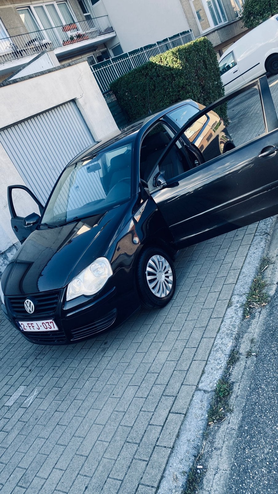 VW polo1.4cc essence/AUTOMATIQUE/2005/airco/très belle état, Auto's, Automaat, Stof, Elektrische ramen, Zwart