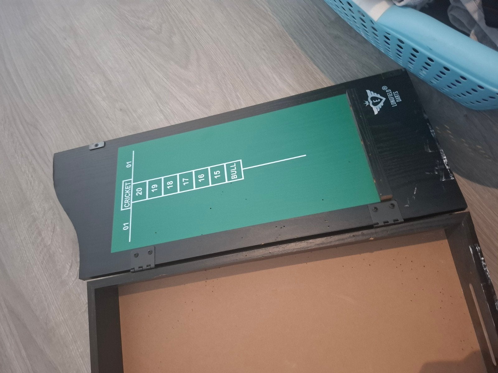 Dartskastje te koop, Ophalen