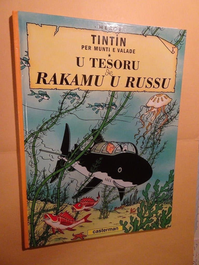 BD Tintin en Monégasque - Le trésor de Rackham le Rouge, Livres, Enlèvement ou Envoi, Une BD, Comme neuf, Hergé.