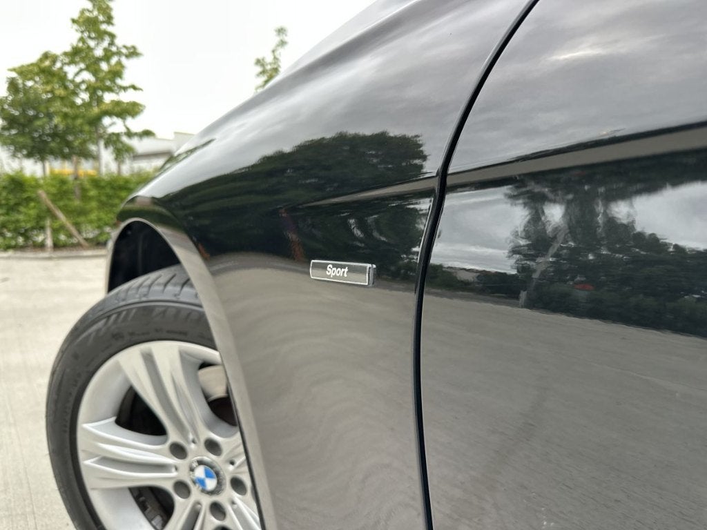 BMW 316i Berline Sport Line 66372km Eerste eigenaar, Auto's, 100 kW, Start-stop-systeem, Zwart, Bedrijf