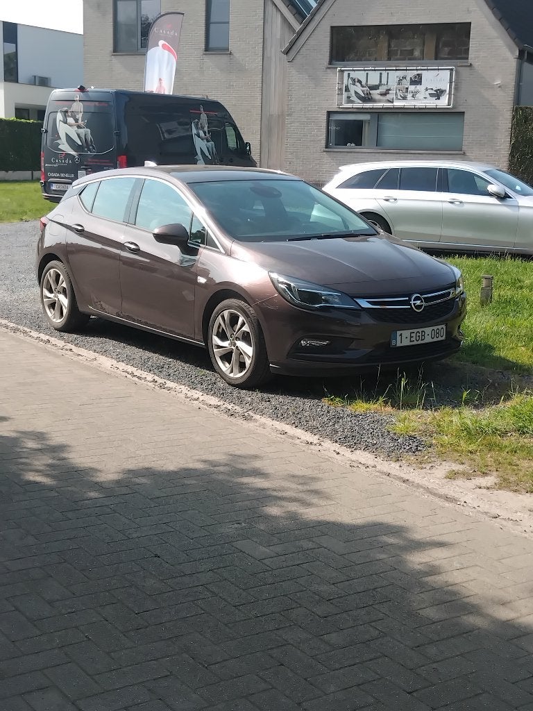 Opel Astra 14 i, Auto's, Opel, Voorwielaandrijving, 4 cilinders, Bruin, Parkeersensor