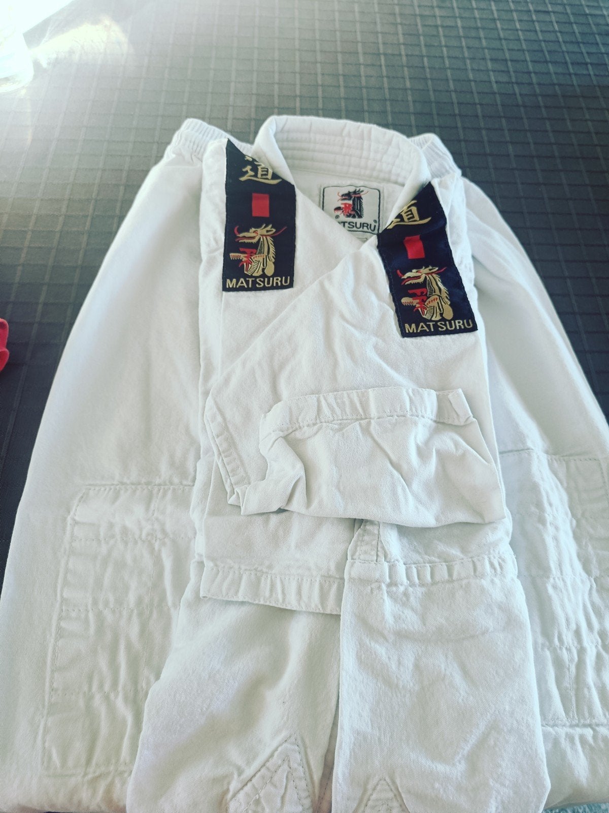 judopak maat 120, Ophalen