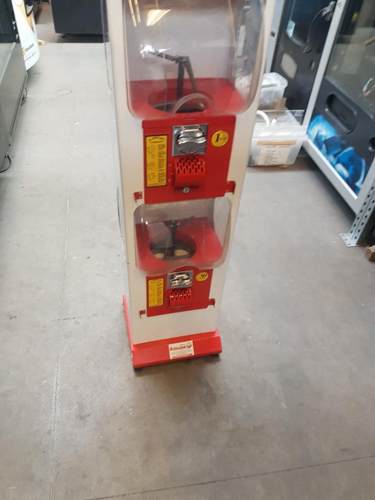 Dubbele  capsule automaten, Enlèvement