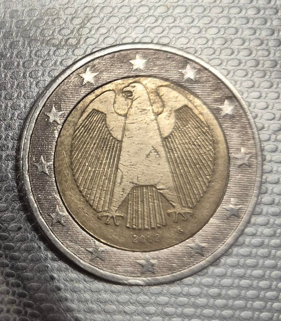 Il s'agit d'une pièce allemande de 2 euros datant de 2002. L, Enlèvement