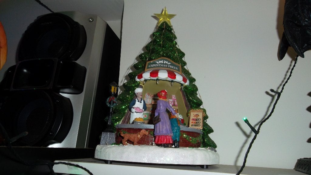 stenen kerstboom met licht en muziek, Ophalen