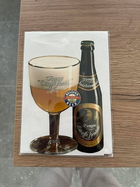 Brugse straffe Hendrik postkaart postcard AVM in blister, Verzamelen, Biermerken, Ophalen of Verzenden, Nieuw, Overige typen, Overige merken