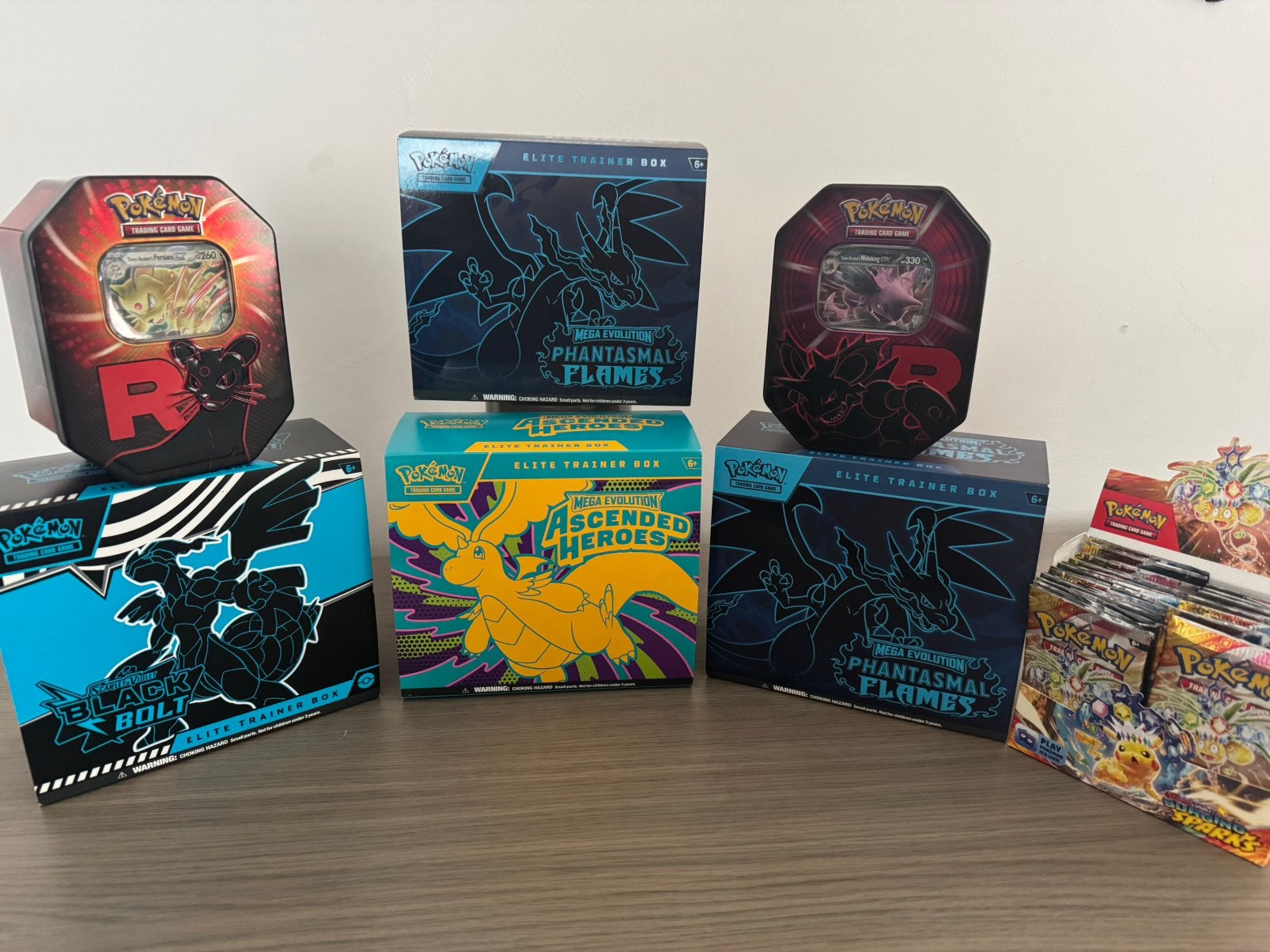 Lot Pokemon tins en trainer boxen geopend, Ophalen of Verzenden, Zo goed als nieuw, Meerdere kaarten