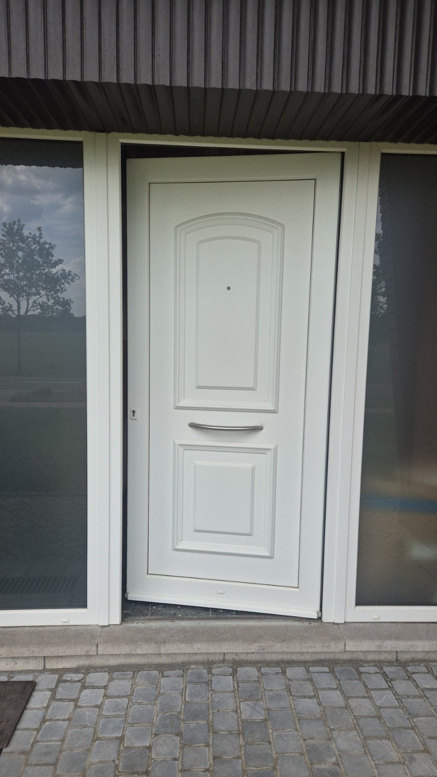 pvc voordeur met 2 zijlichten, Ophalen