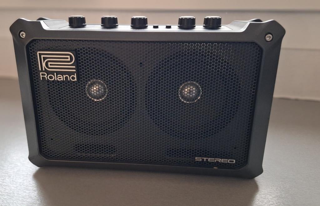 Roland mobile cube met adapter, Ophalen