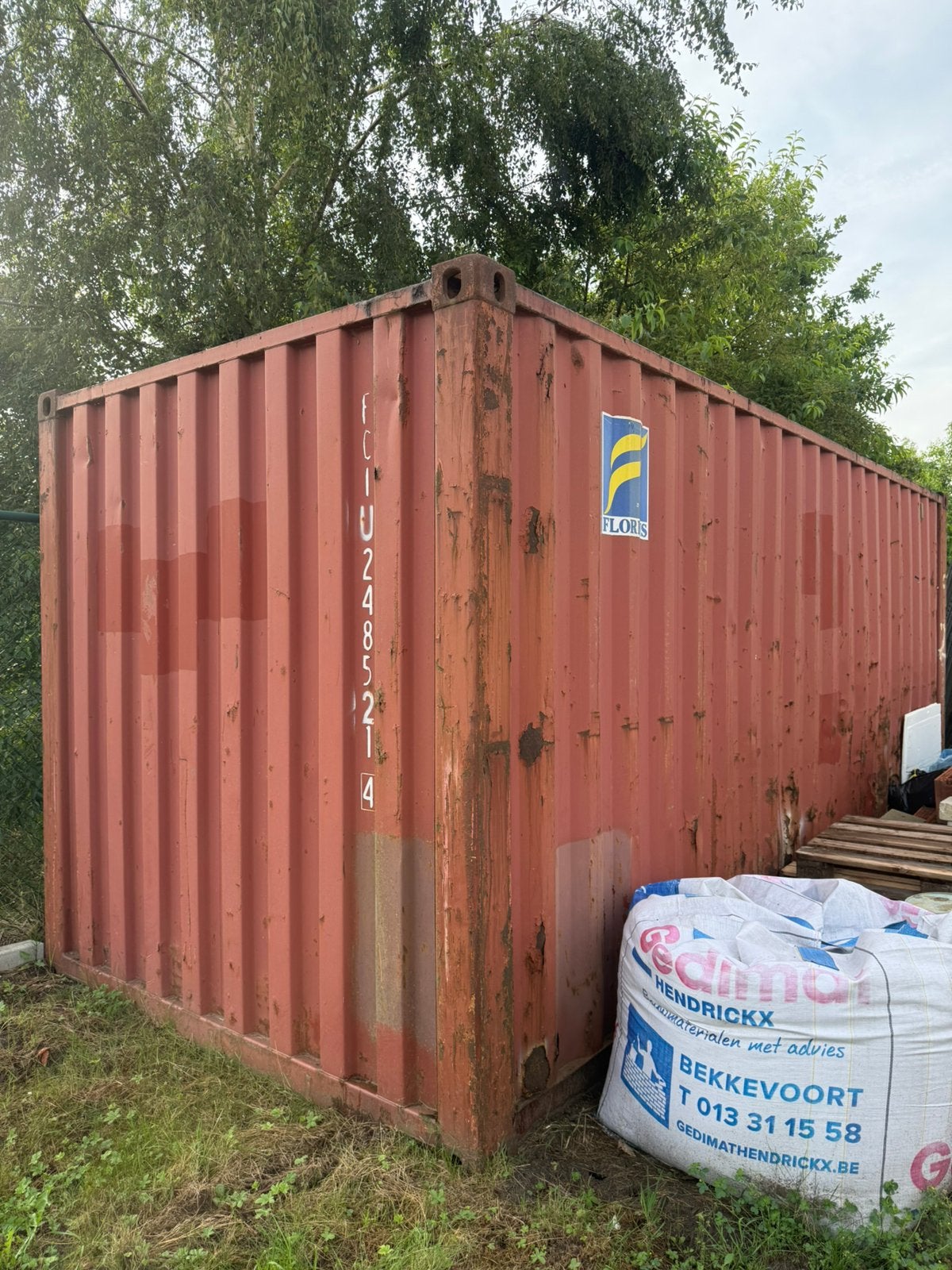Zeecontainer met houten vloer, Ophalen