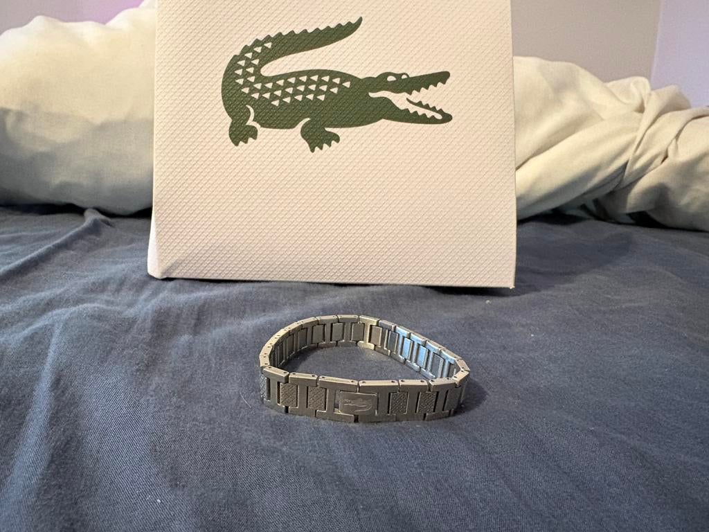 Zilvere Lacoste armband, Handtassen en Accessoires, Armbanden, Ophalen of Verzenden, Zo goed als nieuw, Zilver, Zilver