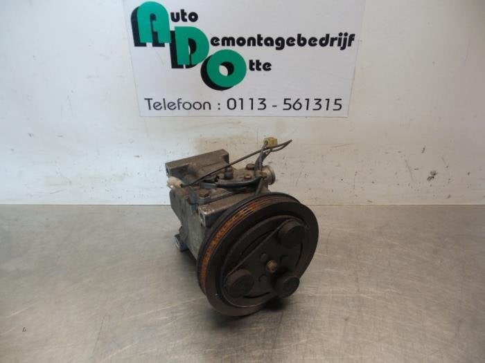 Pompe clim d'un Mazda 323 (323 BJ 98-), Autos : Pièces & Accessoires, -, 3 mois de garantie, Mazda, Utilisé