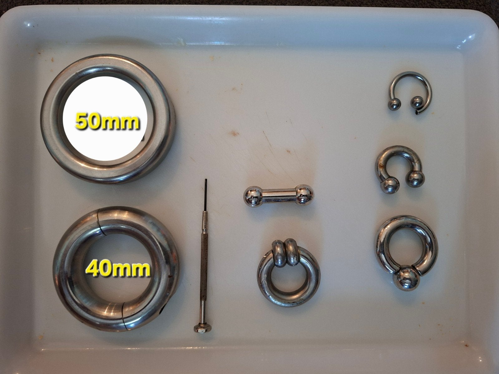 METALEN RINGS TOYS PIERCINGS, Handtassen en Accessoires, Ophalen of Verzenden, Zo goed als nieuw, Staal, Overige typen