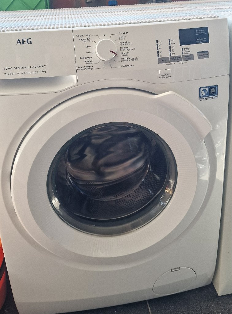 Wasmachine AEG-Elektrolux L6FBT84W, Ophalen, Gebruikt, Voorlader, Energieklasse A of zuiniger