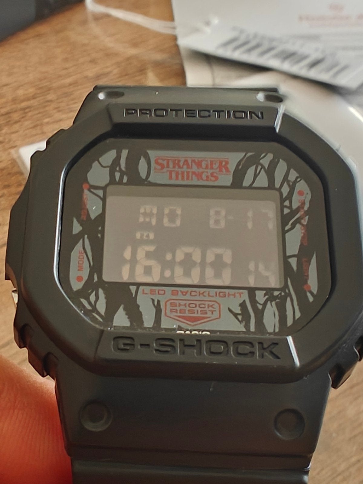 Casio G-Shock Stranger Things limited edition DW-5600STT-1, Handtassen en Accessoires, Horloges | Heren, Casio, Kunststof, Polshorloge