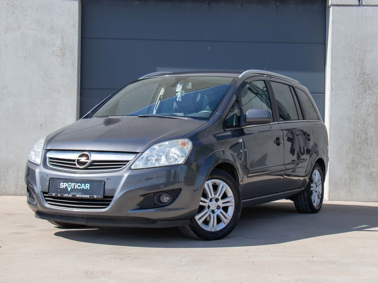 Opel Zafira 1.6 MT5 116PK|7 ZIT|NAVI|TREKHAAK|SENSOREN|, Auto's, Euro 5, 7 zetels, Bedrijf, 157 g/km