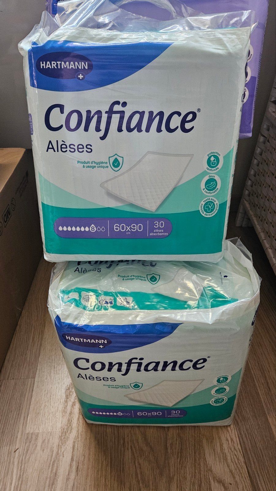 2 pakjes negen grote Hartmann Confidence onderleggers, Ophalen of Verzenden