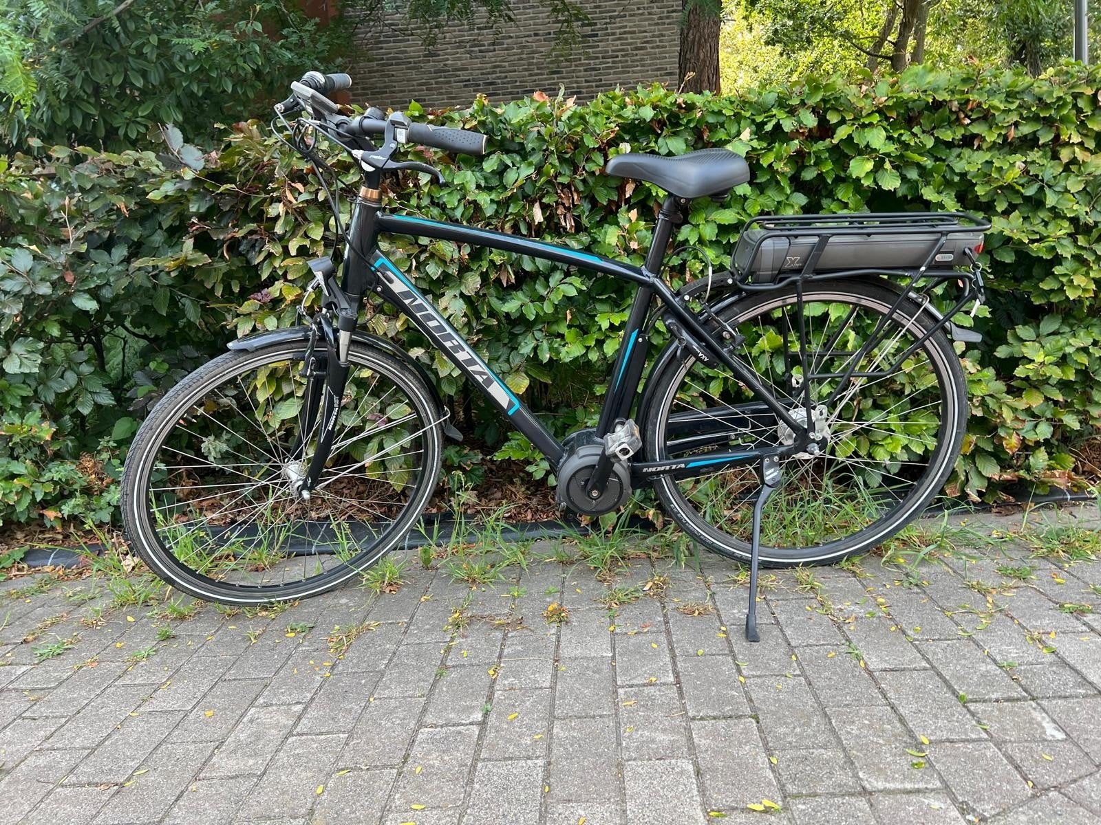 vélo électrique Norta pour homme avec moteur central, Enlèvement
