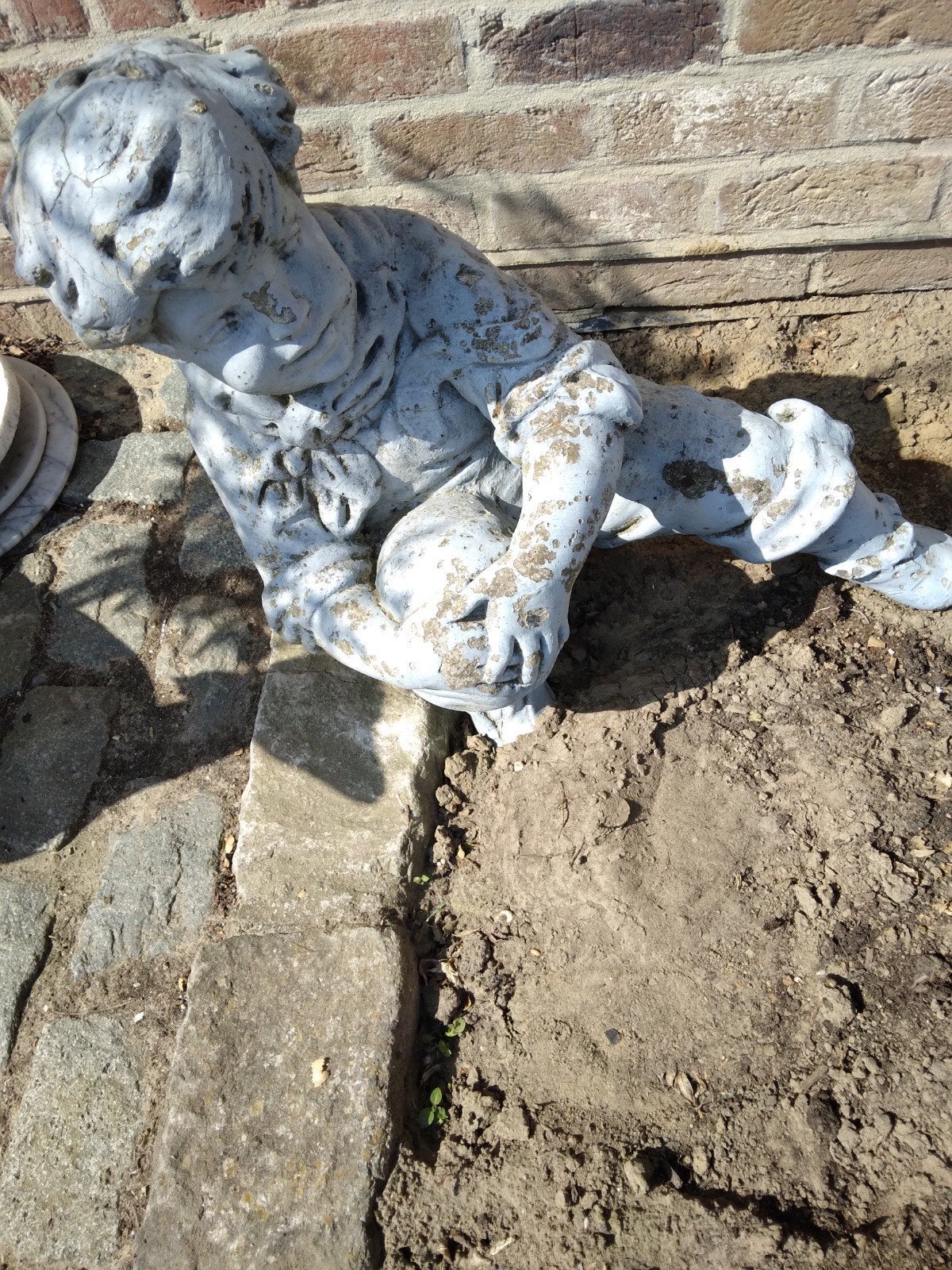 Koppeltje tuinbeelden te restaureren, Tuin en Terras, Ophalen