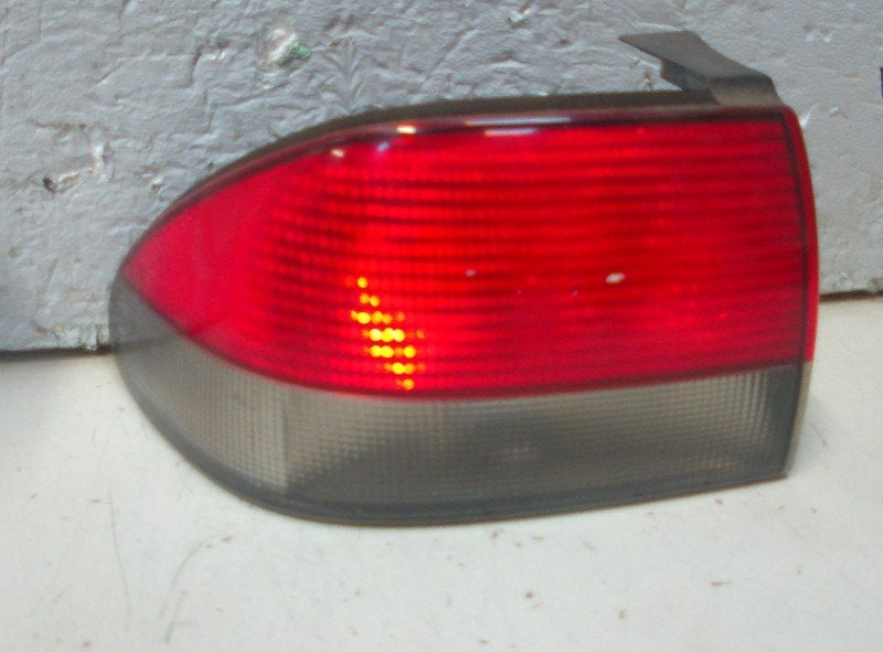 ACHTERLICHT LINKS BUITEN buitenzijde Saab 900 II Coupé, Saab-de-info@saabgroup.com, Saab Deutschland GmbH, Saab, Gebruikt