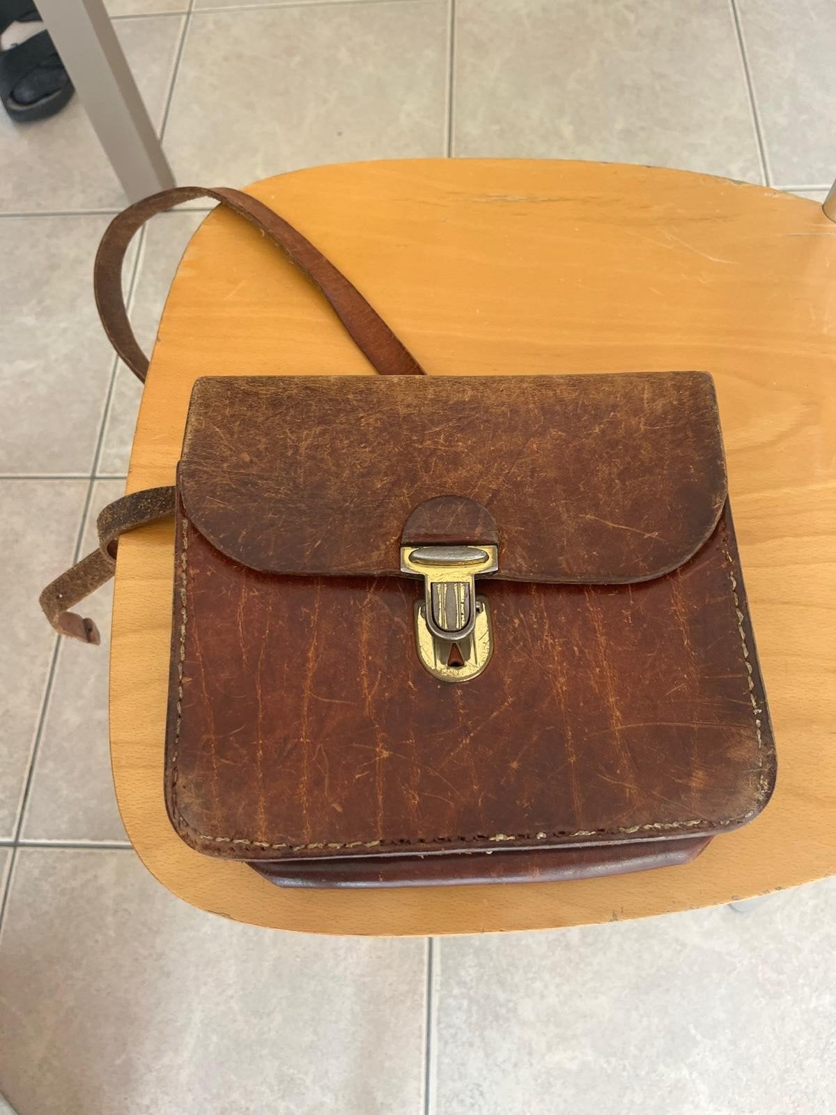 sac en cuir, Enlèvement