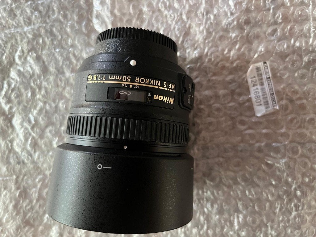 2 lenzen nikkor en sigma, Bouchons d'objectif, Sigma, Enlèvement ou Envoi, Téléobjectif