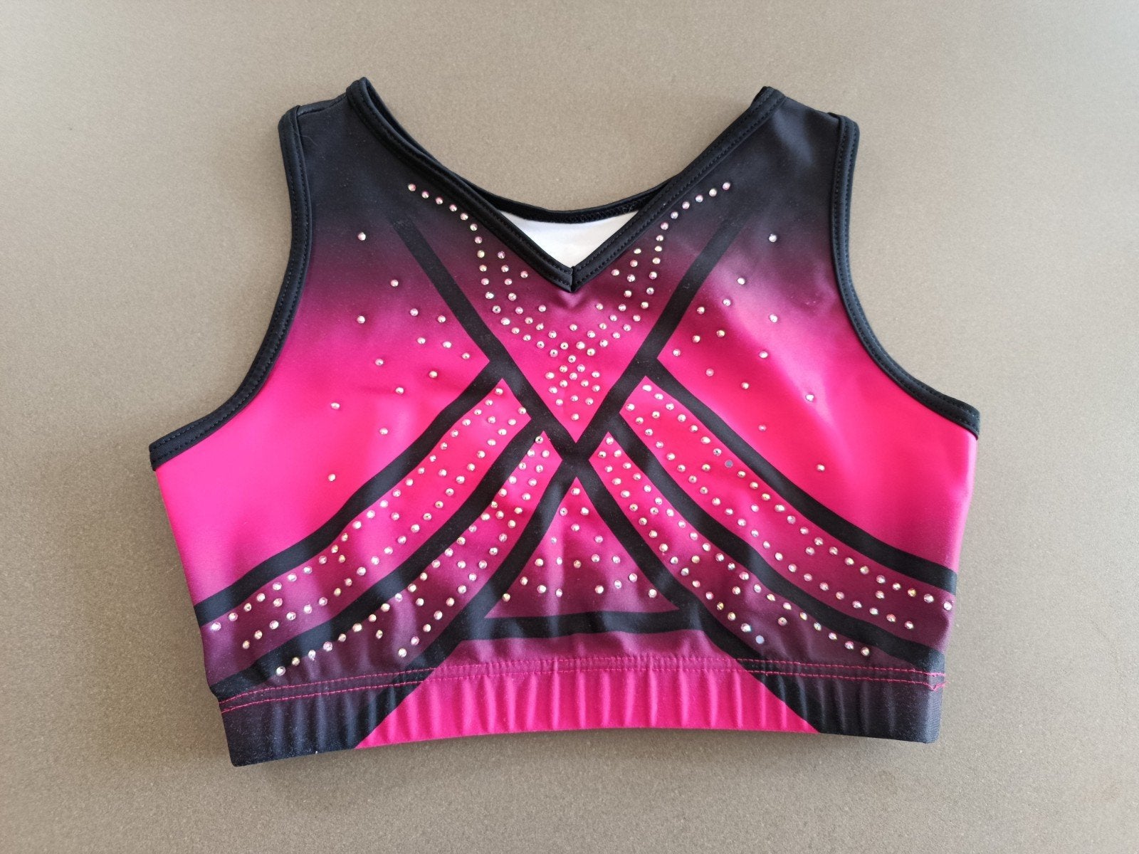 sporttopje Sparkle and Dream - maat AXS (valt als CLA), Sport en Fitness, Ophalen, Gebruikt, Kindermaat 122 t/m 140, Roze