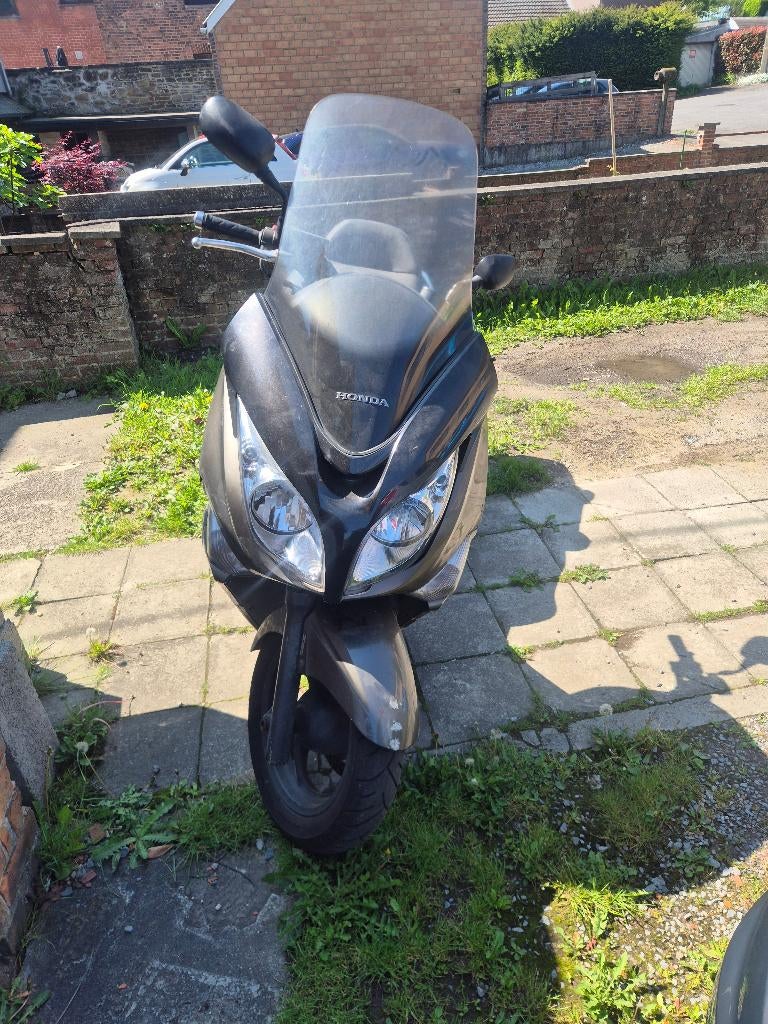 Vend ou échange  honda 600 swt 15000 kl !!, 600 cm³, Scooter, 2 cylindres, Particulier
