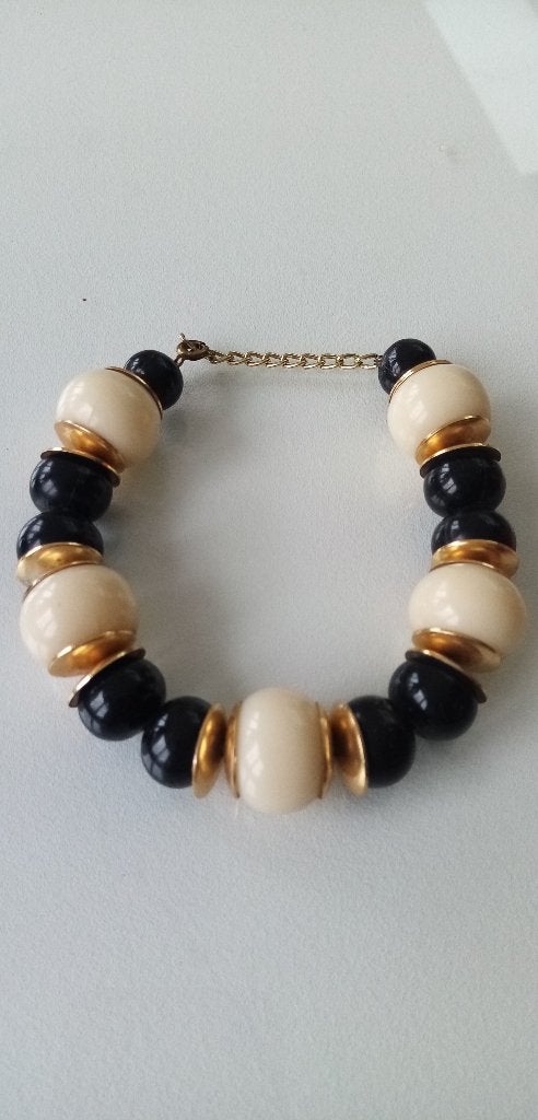 Bracelet vintage '80 crème, noir, doré, ajustable - Impec, Enlèvement, Comme neuf, Autres couleurs
