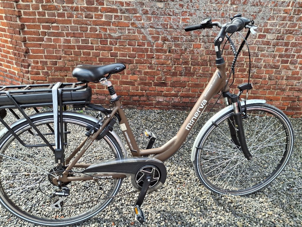 E bike minerva als nieuw nog middenmotor amper 254 km, Fietsen en Brommers, Elektrische fietsen, Ophalen, Zo goed als nieuw, 50 km per accu of meer