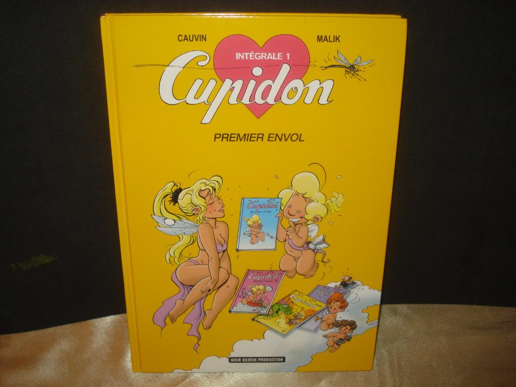 BD "Cupidon Premier Envol" Intégrale Noir Dessin Production, Neuf, Enlèvement ou Envoi, Une BD, Malik / Cauvin